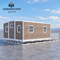 Maison conteneur extensible 20 pieds 40 pieds avec terrasse, maison préfabriquée moderne, maison modulaire avec plateforme surélevée pour la vie en plein air