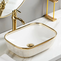 Lavabo de salle de bain rectangulaire en céramique dorée de luxe avec égouttoir pour montage sur robinet monotrou pour la maison ou l'hôtel