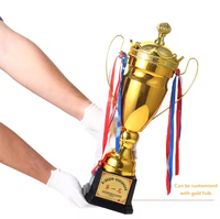 Coupe de trophée de football en métal à prix de gros avec électroplaqué doré, logo et lettres personnalisés, trophées en métal