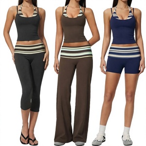 ชุดโยคะผู้หญิง เสื้อครอปแบบผูกคอ กางเกงคาปรีเอวสูง ชุดออกกำลังกาย - Product Image 3