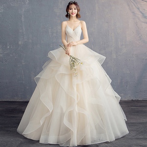 White V-Neck Ball Gown Wedding Dress Champagne Color Floor Length Formal Bridal Dress With Straps Natural Waistline - Product Image 1