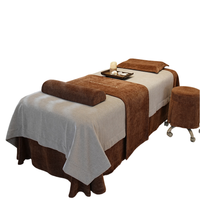 Ensemble de table de massage et de couvre-lit de luxe pour soins du visage, design contrasté blanc et orange