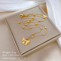 Collier en acier inoxydable plaqué or 18 carats avec pendentif nœud et chaîne perlée, forme papillon, pour femme, idéal pour les fêtes et le quotidien, vente en gros