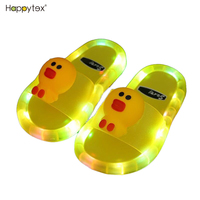 Nouvelles sandales d'été pour enfants, claquettes lumineuses LED pour garçons et filles, motif visage souriant, design à bout ouvert, en PVC, pour la plage