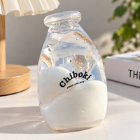 Vente en gros : Jouet anti-stress souple et transparent en forme de bouteille de lait, à remontée lente, jouet sensoriel à presser, cadeau personnalisé OEM