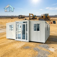 Unité mobile préfabriquée en acier Q355 à toit en pente de 30 pieds, bureau temporaire de cour, maison conteneur extensible au design moderne