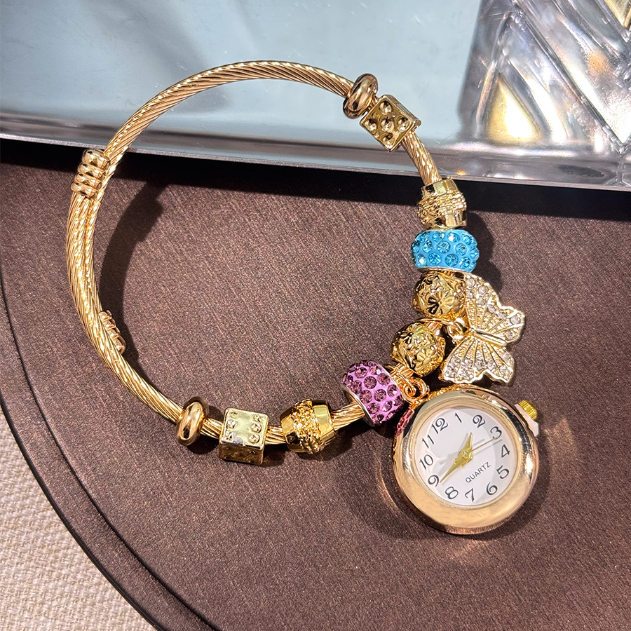 Bracelet doré bleu rose