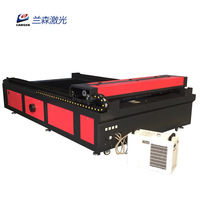 Machine de gravure et de découpe laser à deux têtes populaire pour les vêtements, les cartons, le cuir, la broderie, l'acrylique, le bois
