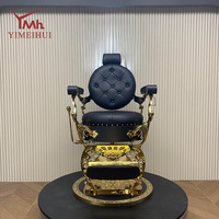 Chaise de barbier vintage de luxe, accoudoirs dorés décoratifs, cuir noir matelassé diamant, avec support hydraulique