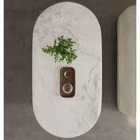 Table basse mobile incurvée en crème, surface en pierre microcristalline, base de rangement avec roulettes silencieuses, bureau minimaliste pour salon