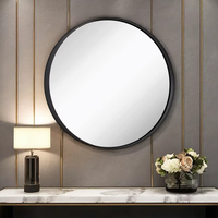 Miroir rond contemporain mural en métal noir avec cadre en fer fait à la main pour vanité de salle de bain chambre à coucher décor à la maison