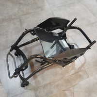 Fauteuil roulant manuel ultra léger en fibre de carbone de qualité supérieure de 8kg avec sac de rangement arrière fauteuil roulant pliable de 24 pouces