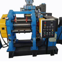 Calandre à caoutchouc automatique à trois rouleaux, rouleaux en fonte refroidie, moteur haute puissance 45 kW, force de serrage 2000 kN, garantie 3 ans, état d'occasion