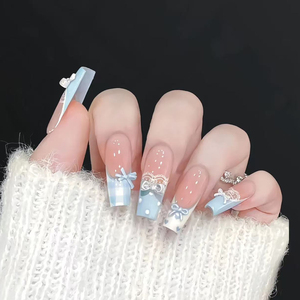 <span class=keywords><strong>Uñas</strong></span> postizas artesanales medianas con diseño de ataúd, en tono nude, con encaje francés, lazo 3D azul bebé y lunares, estilo lindo y kawaii, para uso diario y fiestas. - Product Image 1