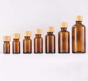 Wholesale 5ml 10ml 15ml 20ml 30ml 50ml100ml Amber Glass Dropper Bottle With Bamboo Screw Caps