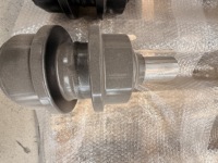 Rouleau porte-chaîne de haute qualité pour chenilles d'excavatrice, roue de support de chenille résistante à l'usure, pièces de machines de construction
