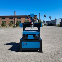 Graveur CNC 6060 à haute rigidité avec corps en fonte, petite fraiseuse CNC pour le travail des électrodes en cuivre et des pièces métalliques