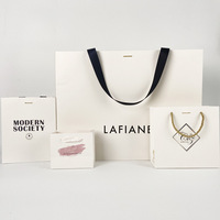 Sacs cadeaux de luxe en papier blanc écologiques personnalisés avec votre propre logo