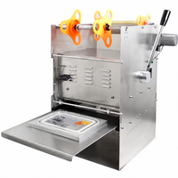 Machine de scellage manuelle pour barquettes alimentaires, machine d'emballage pour barquettes alimentaires