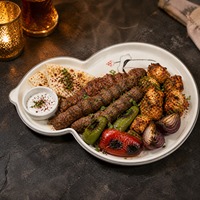 Assiette de service en mélamine en forme de gourde irrégulière incassable pour restaurant
