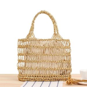 Bolso de mano de paja para mujer, diseño hueco con hilo dorado y plateado, trenzado a mano, para verano, moda, vacaciones, playa, 2024 - Product Image 1