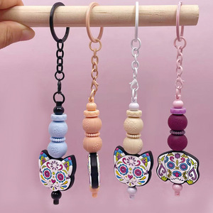 Llavero de silicona con dibujos animados de gatos y perros, con cuentas de epoxi y mosquetón, portátil, para niños y adultos, ideal como regalo o recuerdo de fiesta. - Product Image 1