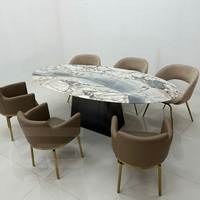 Meubles Gainsville Meubles de maison légers de luxe de forme ovale avec plateau en pierre Table à manger moderne en acier inoxydable Ensemble de table à manger