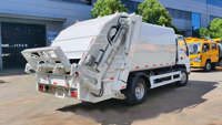 Nouveau camion compacteur d'ordures Isuzu 6-7 CBM à chargement arrière, moteur diesel Euro 6, empattement 3360 mm, boîte de vitesses 4x2, usage municipal