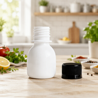 Botol kesehatan Mini isi panas PP oranye bening dan putih kustom botol tembak 2 ons 60ml botol Gerinda pendorong