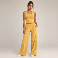 Ensemble deux pièces vintage pour femme en jersey de coton, avec haut ajusté jaune sans manches et pantalon large, personnalisable avec votre marque privée