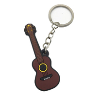 Vente en gros Cadeau de haute qualité Mignon Instrument de musique Guitare Conception Célèbre Marque PVC souple Porte-clés