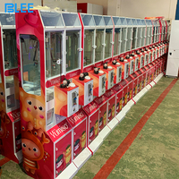 Vente en gros usine : Machine à griffes mini-arcade pour attraper peluches et jouets, à monnayeur et accepteur de billets