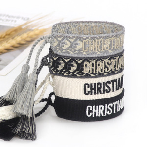 Bracelets d'<span class=keywords><strong>amitié</strong></span> ajustables en corde de coton brodée avec pompons, faits à la main, par LUCY Jewelry – Vente en gros - Product Image 3