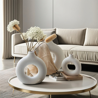 Vase donut de luxe fait à la main Nouveaux designs Vase à fleurs en céramique décoratif nordique pour la décoration intérieure et le mariage pour l'affichage de bureau