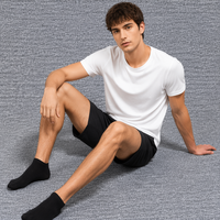 Chaussettes de sport antidérapantes à faible MOQ pour la pratique du fitness, avec coussinets en tissu éponge, en coton et fibre de bambou, jacquard, logo personnalisé, pour le yoga et l'entraînement, légères