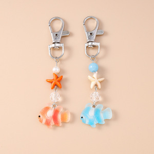 Porte-clés en résine mignonne en forme d'étoile de mer et de poisson doré, pendentifs poisson-clown pour femmes et filles, breloque décorative pour sac à main, bijou cadeau, porte-clés de plage - Product Image 2