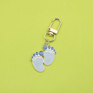 Llavero <span class=keywords><strong>de</strong></span> esmalte con diseño <span class=keywords><strong>de</strong></span> pies <span class=keywords><strong>de</strong></span> bebé, <span class=keywords><strong>de</strong></span> aleación en tono dorado, con cierre <span class=keywords><strong>de</strong></span> mosquetón, <span class=keywords><strong>para</strong></span> etiqueta <span class=keywords><strong>de</strong></span> pañalera <span class=keywords><strong>de</strong></span> recién nacido - Product Image 1