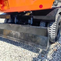 Vente Flash : Excavatrice sur pneus Doosan DX150 d'occasion, 15 tonnes, système hydraulique complet, bon état, livraison rapide, expédition mondiale