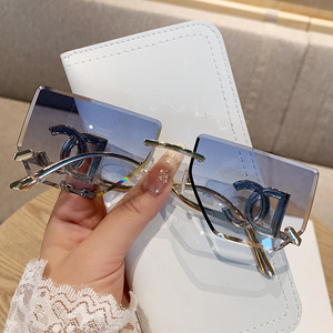 Fashion Frameless Cut Edge Oversized <b>Sunglasses</b> With Hollow Letter Design For Women UV400 Protection Metal Frame PC Lens - Product Image 2
