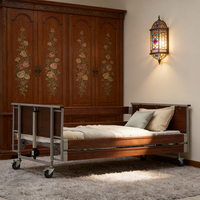 Lit médical électrique pour soins à domicile avec matelas anti-escarres, barrières latérales, fonction toilette, dossier et repose-pieds réglables, capacité 200 kg, certifié ISO