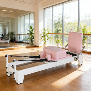 เครื่องรีฟอร์มเมอร์พิลาทิส ยี่ห้อ Core Bed ทำจากหนังสีชมพูและไม้โอ๊ค สำหรับใช้ในสตูดิโอออกกำลังกายและที่บ้าน กำลังลดราคา - Product Image 6