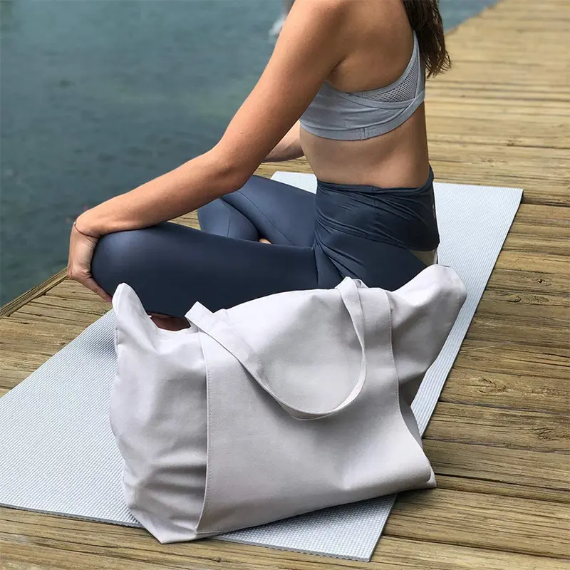 Venta al por mayor de accesorios de yoga grandes con logotipo personalizado gimnasio algodón playa hombro lona bolsa de yoga con portador de esterilla de yoga