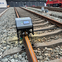 Robot de serrage de boulons ferroviaires entièrement automatique avec reconnaissance de positionnement et serrage de boulons par commande à une touche