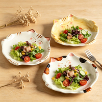 Nouvelles assiettes en céramique créatives en forme de chat Kawaii, assiettes à dessert irrégulières en céramique mignonnes de style dessin animé pour la maison et la restauration
