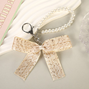 Llavero <span class=keywords><strong>de</strong></span> cadena <span class=keywords><strong>de</strong></span> perlas con lazo floral pequeño estilo coreano, set <span class=keywords><strong>de</strong></span> regalo <span class=keywords><strong>de</strong></span> 8 llaveros elegantes con lazo, dijes <span class=keywords><strong>de</strong></span> cadena <span class=keywords><strong>de</strong></span> perlas virales <span class=keywords><strong>de</strong></span> TikTok para bolsos - Product Image 2