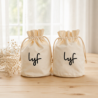 Sac cadeau beige personnalisable de marque privée, design durable et réutilisable, sac en toile de coton avec cordon de serrage et bords arrondis