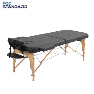 <span class=keywords><strong>Table</strong></span> <span class=keywords><strong>de</strong></span> <span class=keywords><strong>massage</strong></span> pliable portable avec matériau PU, éponge haute densité et cadre en bois - Personnalisable pour usage commercial - Product Image 1