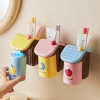 Support mural pour brosses à dents en plastique imprimé, design minimaliste et attrayant, fixation sans perçage par ventouse, idéal pour le rangement de la salle de bain familiale, parfait pour les enfants