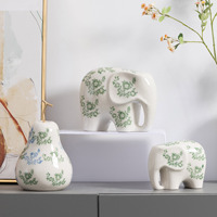 Statue d'éléphant en porcelaine blanche à glaçure craquelée avec motif floral vert, décoration de table pour la maison