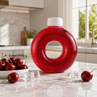 Bouteilles en plastique transparent PETG de 400 ml et 500 ml en forme de donut pour jus, qualité alimentaire, avec anneau et bouchon à poignée portable pour thé au lait Boba – Vente en gros